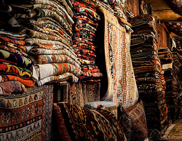 Turkish rugs piled up for sale